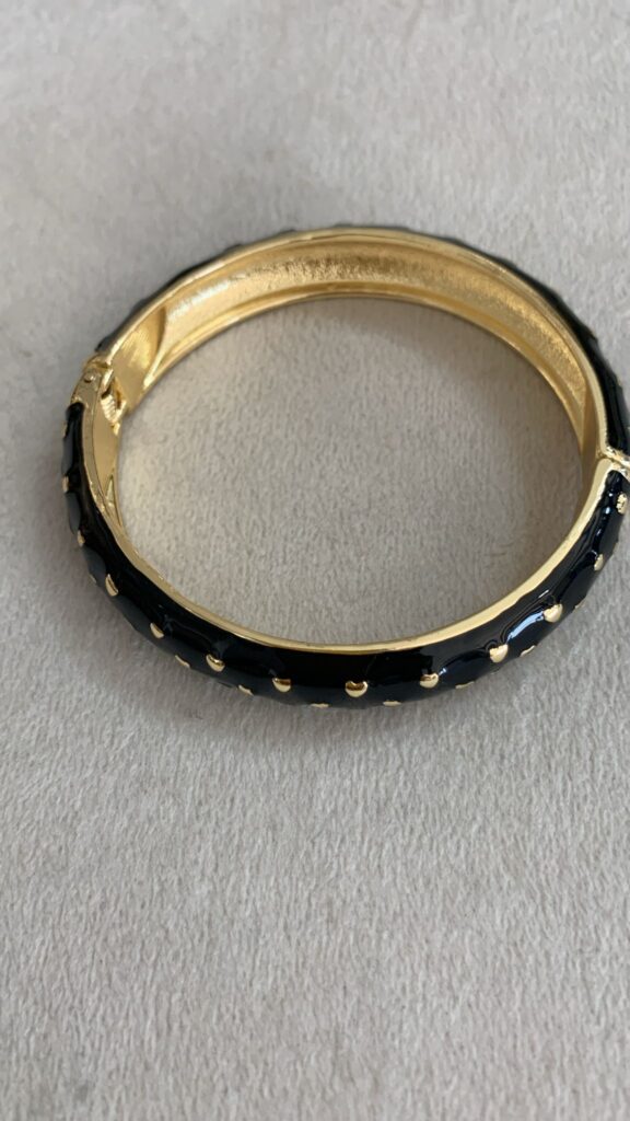 Aro negro con puntos dorados